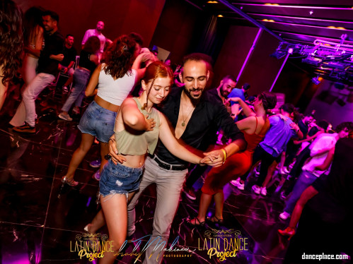 Social dance event with colorful lighting